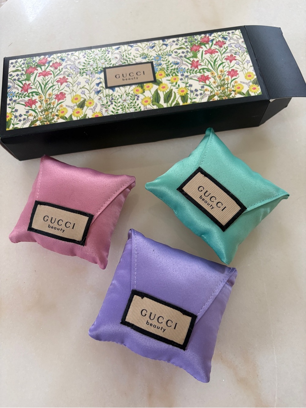 Gucci Beauty Satin Puffs in Pink, Mint and Lavender